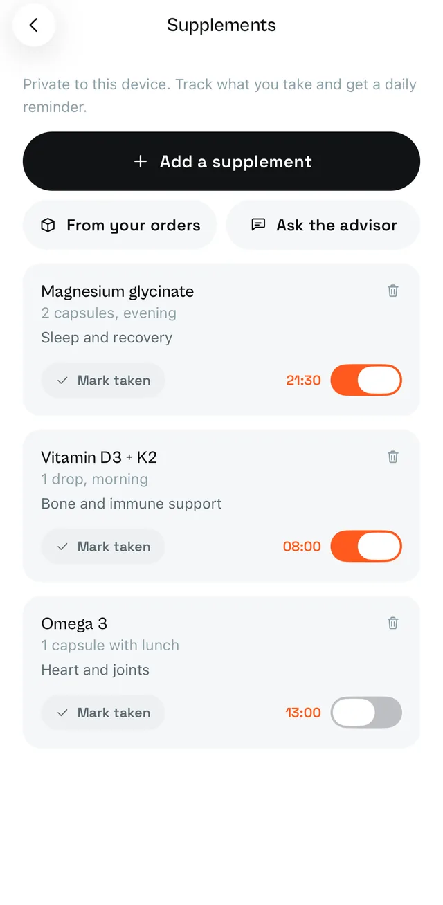 The Supplements screen: three supplements with doses, ticks and reminder times
